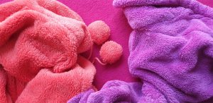 pink and purple piled textiles pink and purple piled textiles
